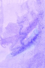 Light lilac watercolor background. Transparent lines and spots. Paint leaks and ombre effects. Abstract hand-painted image.