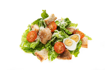 Caesar salad with chicken, croutons and parmesan  isolated on a white background