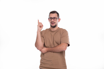 Fototapeta premium Man Showing Finger Up Isolated Smilling. Man Wearing glasses. Man With Good Idea Gesture. Idea Symbol