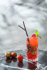 strawberry mojito with mint leaf on marble table. fresh drinks with strawberry on light background