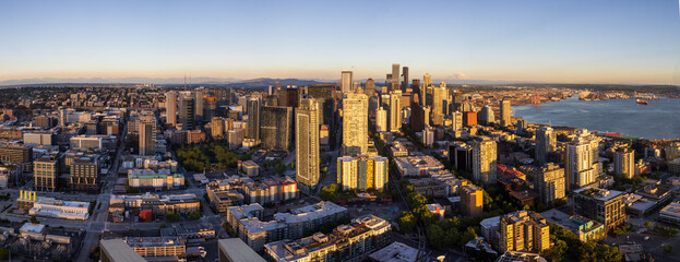 Seattle, Washington, USA - June 4 2021: Seattle downtown panoramic skyline during summer sunset. View from Seattle needle.