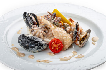 Rice with seafood: shrimp, squid and mussels. Isolated on a white background.