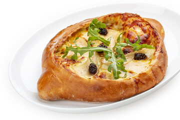 Traditional Georgian cuisine. Adjarian khachapuri. Isolated on a white background.