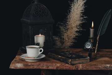 Fortune telling on coffee grounds by candlelight.