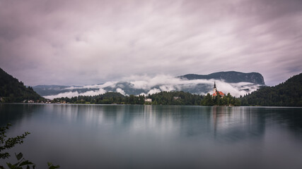 Beautiful mountain lake with Pilgrimage Church of the Assumption of Mary on a small island in summer, Bled, Slovenia
