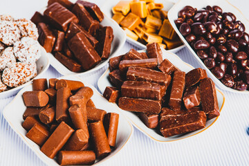 Assortment of delicious chocolate candies background. Chocolate candy isolated 