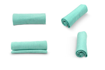 set of blue towel rolled into a tube from different angles, white background