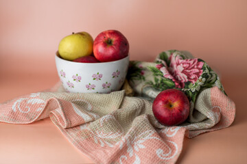 still life with apples and a towel