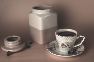 still life with a coffee mug and coffee beans