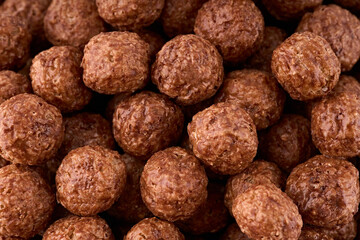 Variety of cold cereals, quick breakfast for kids overhead shot. Quick breakfast. Chocolate balls isolated on a white background. Rings isolated on a white background. 