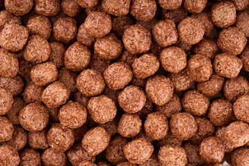 Variety of cold cereals, quick breakfast for kids overhead shot. Quick breakfast. Chocolate balls isolated on a white background. Rings isolated on a white background. 