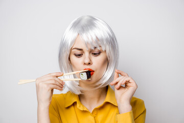 pretty woman with white hair sushi asian food