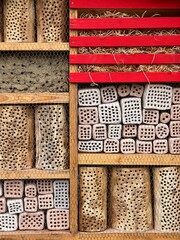 insect feeder made of wooden blanks with various holes