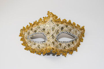 carnival golden mask on a white background
