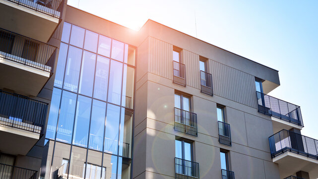 Residential apartment modern housing. Glass city architecture. Luxury business building. Family home.