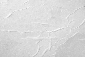 Obraz premium Abstract background of white crumpled paper. The texture of the paper.