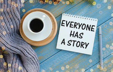 Everyone has a story concept Notepad and cup coffee