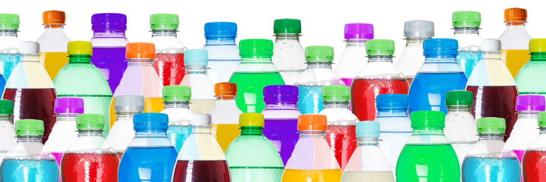 Drinks lemonade cola drink softdrinks in bottles background panorama isolated on white
