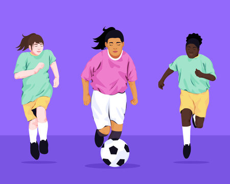 Diverse women playing football match