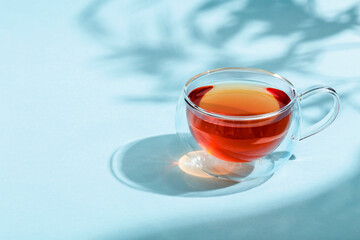 glass cups of tea on lightn table