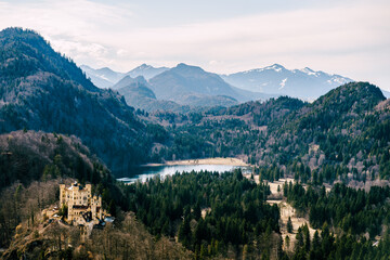 Obraz na płótnie Canvas Hohenschwangau Castle on a mountain near the lake. View from above