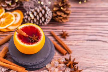 Gluhwein sweet hot warm Mulled red Wine or punch tea in mug cup glass spices citrus aromatic cinnamon star anise German tradition winter Christmas market beverage drink new year holidays festival