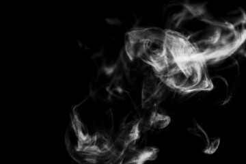 White steam smoke on solid black background with abstract blur motion wave swirl use as an overlay effect for vapor cigarette dry ice hot water and food soup