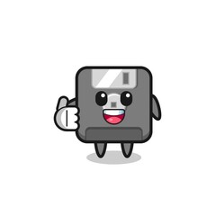 floppy disk mascot doing thumbs up gesture