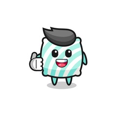 pillow mascot doing thumbs up gesture
