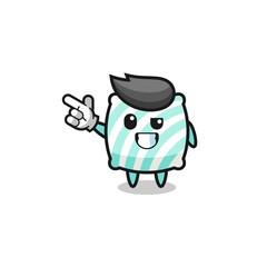pillow mascot pointing top left