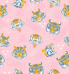 Tiger head vector seamless pattern on pink background. Funny flat vector illustration. Modern cute background design.