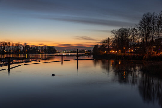 Fraser River on a calm evening at sunset or dusk - Vancouver, BC Canada