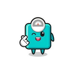 weight scale character doing Korean finger heart