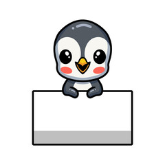 Cute little penguin cartoon with blank sign