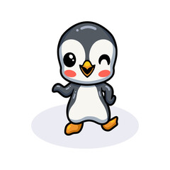 Cute little penguin cartoon waving hand