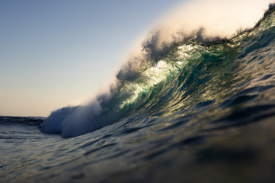 Foamy waves rolling up in ocean