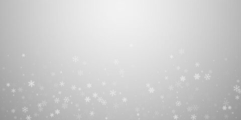 Sparse snowfall Christmas background. Subtle flyin