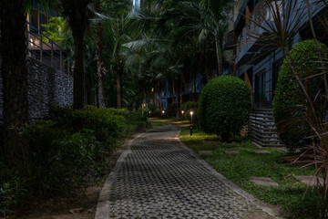 Night path in a condominium with lighting.