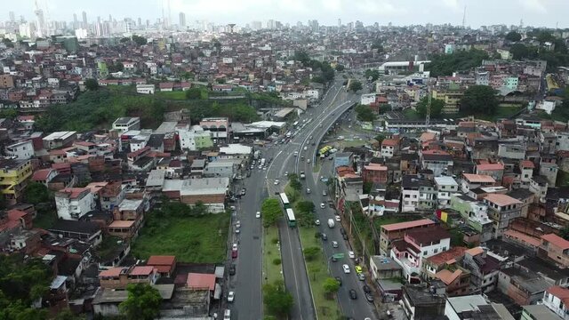salvador, bahia, brazil - november 24, 2021: movement of vehicles in the region of Vasco da Gama next to popular housing in the city of Salvador.