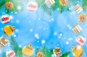 Christmas festive frame of fir branches, golden cones and various Christmas tree decorations on a blue background with bokeh