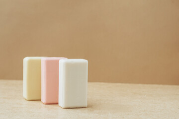 Bars of soap made from natural raw materials beige background. Organic cosmetics Spa health concept natural cosmetics