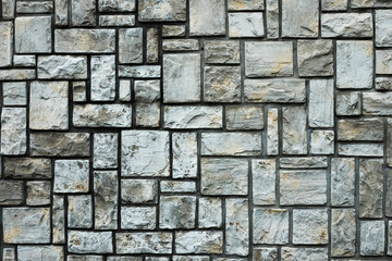 Texture of a stone wall. Stone wall as a background or texture. Part of a stone wall, for background or texture