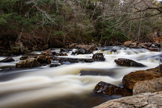 A long exposure image of rapids on the Sacandaga River in the Adirondack Mountains