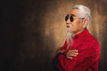 chinese old man wearing sunglasses with white hair and beard