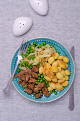 Baked gnocchi with stews and vegetables.