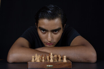 chess player looking at a challenging way