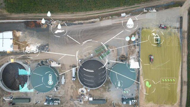 Aerial view of biogas plant farm. Renewable sustainable green energy from biomass, graphics and statistic show the sustainability of the municipal waste project, AI control temperature data parameters