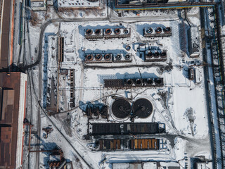 Close-up of oil and gas refineries zone, Steel pipeline equipment detail. air pollution. fly a drone