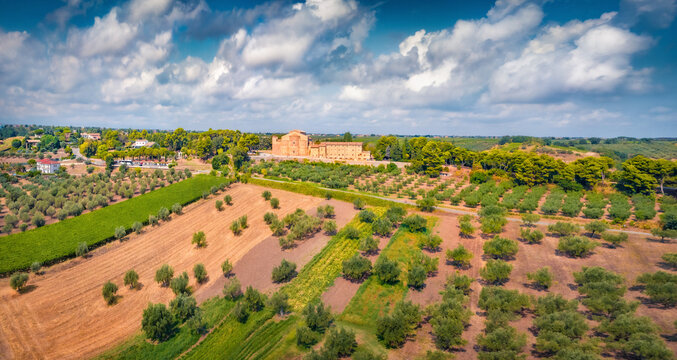 Impressive summer view from flying drone of Abbey of San Giovanni in Venere. Picturesque morning scene of olive garden in Italy, Europe. Traveling concept background.