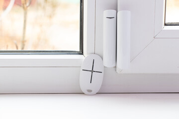 home security system on the windows, opening sensor and remote control in opening and closing,...